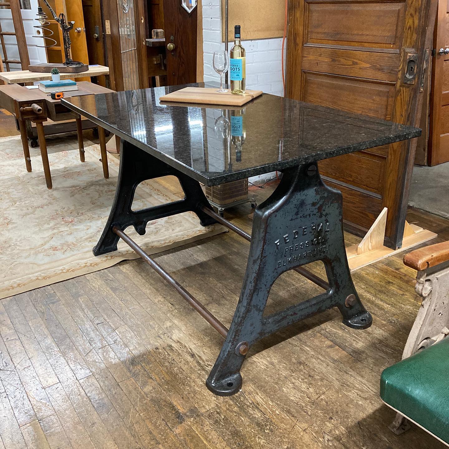 Reclaimed Table with Vintage Industrial Cast Iron Machine Legs and Granite Top