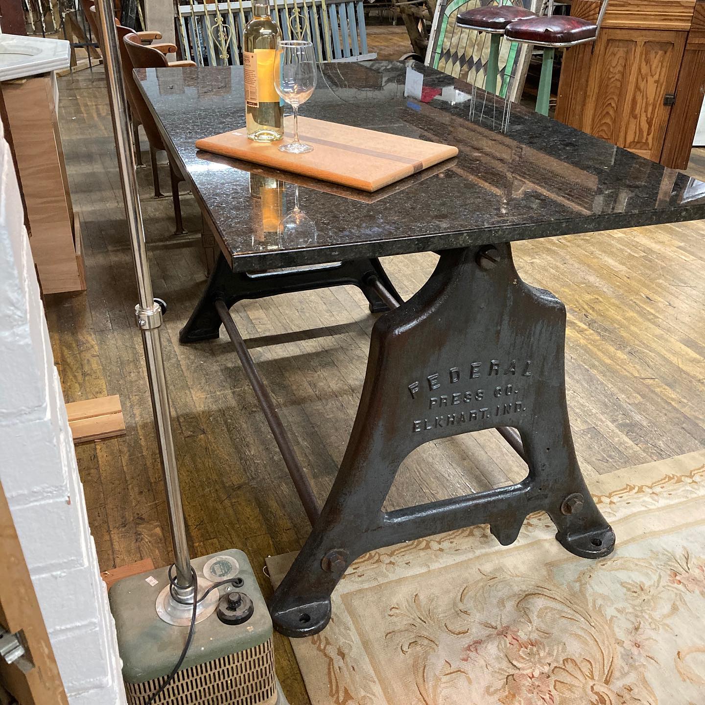 Reclaimed Table with Vintage Industrial Cast Iron Machine Legs and Granite Top