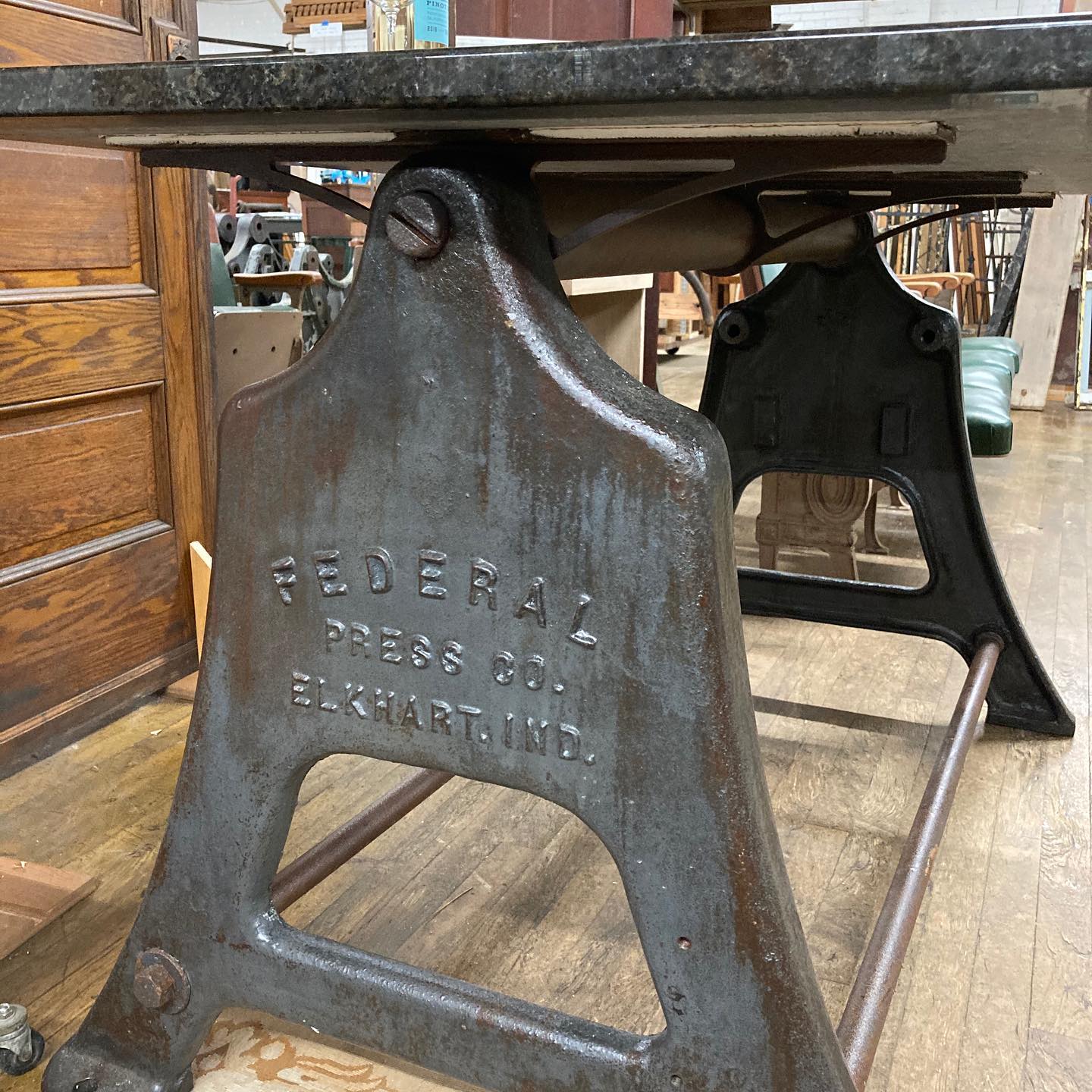Reclaimed Table with Vintage Industrial Cast Iron Machine Legs and Granite Top