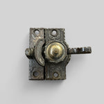 Load image into Gallery viewer, Antique Ornate Cast Iron With Brass Accent Window Lock
