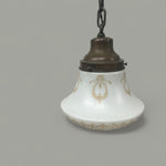 Load image into Gallery viewer, Antique Brass Pendant Light with Ornate Stenciled Glass Globe - Rewired
